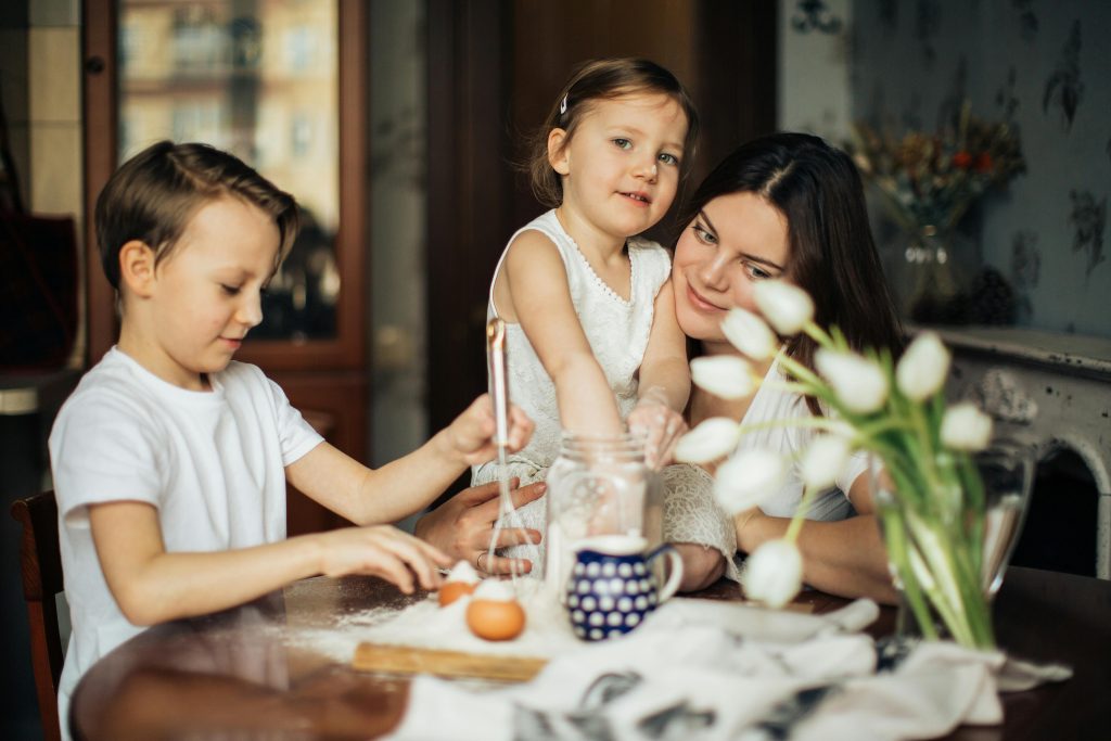 Family enjoying freedom from passive income online business models. side hustle for busy parents